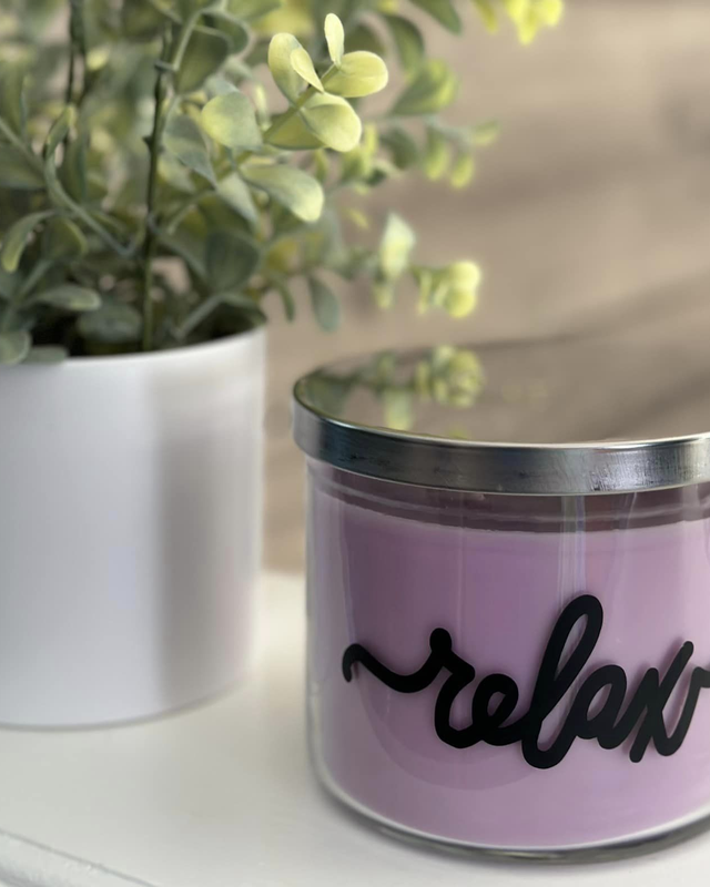 Huntington 3-Wick Relax Candle with Silver Lid, Meditation Silhouette, and Flower Decoration on Wooden Background